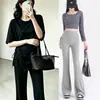 Conjunto de duas peças de moda gestante estilo coreano para o verão, camiseta de cor sólida irregular com cordão, calça flare de cintura alta plus size que cobre a barriga e emagrece