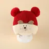 Bonitos y adorables gorros de otoño e invierno para niños, con diseño de poner, material de punto y una serie de dibujos animados, que brindan abrigo y protección para los oídos para bebés y niños pequeños.