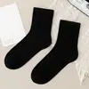 Meias infantis meninas Zhuji meias esportivas brancas atacado meias cano alto absorventes de suor meninos e estudantes meias brancas