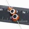 Venta al por mayor Ojo del Diablo 6-10 mm cuentas planas para ojos cuentas de resina para ojos con agujero pasante accesorios de ojo de pez cuentas sueltas