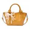 Bolsa de Cubo de Agua Portátil Simple 2026 Verano Nueva Moda Sensación de Alta Gama Bolso de Hombro Único Popular Elegante Nicho Bolso Cruzado
