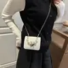 Bolsas Elegantes de Personalidade Tecidas para Comércio Exterior 2026 Moda Casual Bolsa de Ombro Transversal Tendência Feminina Pequena Quadrada Texturizada