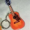 Llavero de guitarra acrílico, colgante musical creativo, decoración colorida estilo retro para mochila y coche, arte moderno