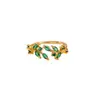 Europa y Estados Unidos transfronterizo exquisito anillo de flor con incrustaciones de circón verde para mujer 2025 nuevo anillo retro de alta calidad al por mayor