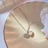 Versión coreana estilo Ins del nuevo collar de concha de perla para mujer, diseño único, popular en redes sociales, joyería simple de acero de titanio