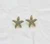 Pendientes Transfronterizos Europeos y Americanos, Pendientes con Textura de Estrella de Mar Estilo Vacaciones en el Océano, Pendientes de Diseño Simple de Perla de Nicho Venta al por Mayor