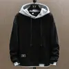 Sudadera con capucha para hombre, primavera y otoño, fina, holgada, marca de moda, chaqueta de dos piezas falsa, top casual de moda para hombre