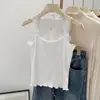 Entrega en una pieza dulce encaje pequeño tirante fino mujer primavera y verano anti-exposición dulce picante top corto chaleco blanco puro