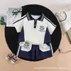 Nuevo Traje de Verano Delgado de Manga Corta para Bebés e Infantes, Elegante Conjunto de Dos Piezas de Ropa Rayada con Solapas para Bebés Pequeños
