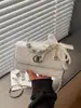 Bolso Pequeño Cuadrado Estilo Coreano Ins para Mujer 2026 Nuevo Modelo Bolso de Hombro con Hebilla de Cierre Estilo Coreano Bolso Cruzado Bolso de Mano Color Sólido para Viajes Cotidianos