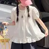 Conjunto de Blusa Estilo Boneca com Mangas Bufantes para Meninas Verão 2026 Novo Estilo Coreano Tendência Conjunto de Duas Peças com Shorts para Meninas Mais Velhas