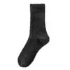 Calcetines de piel de visón para invierno, forrados de felpa y engrosados, para uso en interiores, calcetines cálidos para dormir, elásticos y antideslizantes, de longitud media hasta la pantorrilla, adecuados para parejas, felpa
