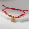 Pulsera tejida de hilo rojo estilo chino con símbolos auspiciosos, flores, estrellas de mar, elefante auspicioso y Dios de la Riqueza, ajustable para el año zodiacal, colección de pulseras