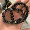 Pulsera para Hombre de Piedra Volcánica Negra Nueva Transfronteriza con Hematita Negra Esmerilada, Traje de Pulsera Elástica de Calavera Microincrustada, Joyería