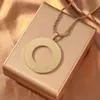 Colar Transfronteiriço de Aço Titânio Masculino Europeu e Americano Versátil de Alto Padrão Pingente Redondo Oco de Aço Inoxidável Colar Joia de Nicho Feminino