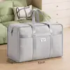 Bolsas de almacenamiento de tela no tejida engrosada para uso doméstico, adecuadas para guardar ropa y ropa de cama, a prueba de polvo y humedad, plegables, ideales para mudanzas, uso en dormitorios y para empacar y almacenar artículos.