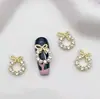 Corona de Navidad aleación joyería de uñas lazo taladro de uñas red roja perla terminada pila taladro accesorios de uñas al por mayor