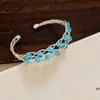 Pulseira-anel de metal com design único, trançada em espiral com contas de vidro, estilo novo, joia feminina requintada