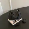 Bolso de Hombro Simple de Color Sólido de Alto Valor, Nicho, Estilo Relajado, Personalidad, para el Trabajo, Moda, Otoño 2026