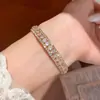 Pulseira Oval com Zircônia Banhada a Ouro 18k Real Moda Simples Versátil Anel de Mão Leve Luxo Nicho Toque de Alto Padrão Joia para Mão