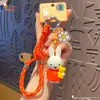 Llavero Colgante Auténtico Conejo Miffy Nariz Pequeña Femenino Lindo DIY Pareja Cadena de Teléfono Móvil Anillo Colgante de Mochila Escolar