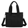 Bolsa de lona estilo bosque con múltiples compartimentos, bolsa tote pequeña estilo japonés ins para mujer, para estudiantes, para ir al trabajo y al día a día, se puede llevar cruzada