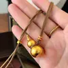 Tienda de Oro Mismo Estilo Collar de Cuerda Trenzada Calabaza Dorada Diseño Largo Diseño de Nicho Colgante de Buena Suerte Collar de Seguridad para Parejas