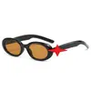Gafas de sol de moda europea y americana con montura ovalada pequeña y patillas en forma de estrella, aspecto natural, adelgazantes, versátiles, estilo ojo de gato, a la moda.