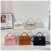 Celebridad de Internet Bolsa Popular Bolsa de Mujer 2025 Nueva Textura de Alta Gama Bolso Cuadrado Pequeño de Hombro Bolso Cruzado de Mano Kelly