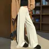 Foto real das novas calças femininas de outono 2026: calças casuais de lã de cashmere de cintura alta, levemente flare, perna larga, comprimento total para mulheres