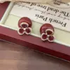 Pendientes de Flor de Cristal Rojo Perla Delanteros y Traseros Acceso de Lujo Otoño e Invierno Moda Exquisita de Gama Alta Pendientes Versátiles Pendientes