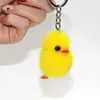 Mini peluche de pollo de pelo de visón súper lindo, colgante de patito de peluche amarillo para bolso, accesorio de teléfono, llavero de pato, venta al por mayor
