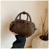 Bolsa de Bolos Portátil de Alta Gama Transfronteriza para Mujer, Nueva Bolsa Cuadrada Pequeña Retro Otoño e Invierno 2026, Bolso Cruzado de Gran Capacidad