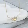 Outono e Inverno nova corrente de clavícula elegante banhada a ouro real com zircônia incrustada design de nicho feminino pingente de coração colar de pérolas