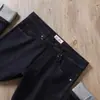 Estación europea otoño e invierno gruesos alta gama lujo ligero color sólido simples suaves microelásticos casuales combinan con todo jeans rectos para hombre
