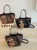 Cross2026 Otoño Estilo Coreano Moda Alta Apariencia Bolso de Hombro Cruzado Bolso de Mano de Temperamento Simple Bolso Tote Elegante