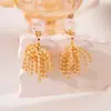 Diseño de Nicho Aretes de Triángulo con Fuegos Artificiales de Perlas Retro Lujo Accesible Únicos Sin Perforar Moda Simple Pendientes con Borlas