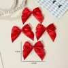 Acessórios de cabelo de laço de cetim 6,5*6,5cm transfronteiriços, materiais de artesanato DIY, acessórios de brinquedo, laços para atacado