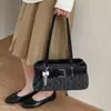 Bolso de mano nuevo para mujer 2026, bolso de hombro para el trabajo, bolso de nicho estilo coreano, bolso versátil para el antebrazo, exquisito y moderno con lunares