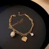 Pulseira Retro de Pérolas de Camada Dupla Coração Moda Feminina Criativa Estilo Frio Estilo Mori Versátil Elegante Pulseira de Pérolas Pulseira