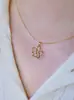 Collar con Colgante Estilo Luochen Ins Dulce y Fresco Flor Calada Incrustada con Circonita Cadena para Clavícula de Diseño Creativo para Mujeres