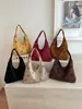 Bolso de hombro para mujer estilo coreano transfronterizo estilo universitario, bolso tote casual nuevo con diseño calado, bolso simple de gran capacidad para el día a día, para llevar debajo del brazo