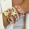 Conjunto de pulseiras de férias estilo boêmio transfronteiriço europeu e americano, pulseira multicamadas com sementes, concha e estrela-do-mar