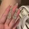 Aretes Medievales Dorados en Forma de Abanico Gota de Agua Elegantes Aretes de Borla Larga Aretes Retro Diseño Femenino de Alta Gama