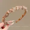 Diadema retorcida fresca y elegante, de lujo ligero para mujer, adecuada para el uso diario en primavera y verano, diadema de ala ancha, dulce accesorio para el cabello estilo coreano