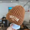 Chapéu de lã trançado estilo coreano ins com letras, para outono e inverno, protegendo as orelhas, para meninos e meninas, chapéu de bebê quente, atacado