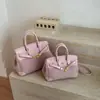 Bolso de mano vintage de platino de alta gama para mujer, nuevo modelo 2026, moderno y versátil para ir al trabajo, bolso de hombro y cruzado, comercio exterior