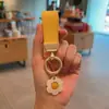 Llavero de Coche de Cuero Minimalista de Alta Gama Estilo Francés, Colgante de Llave Simple y Lindo, Mismo Estilo que en Xiaohongshu, Diseño de Girasol