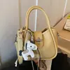Bolsa de Ombro Cruzada Simples e Versátil Estilo Coreano Transfronteiriça para Uso Diário Casual Feminina Lançamento Primavera 2026 Bolsa de Balde Cruzada de Nicho