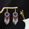 Brincos Étnicos Retrô Transfronteiriços Brincos Longos com Franjas Vermelhas Estilo Boêmio Brincos de Férias em Yunnan Estilo Exótico